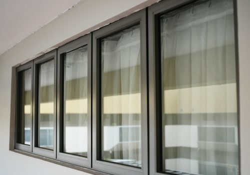 Modern building with tinted windows. Urban architecture