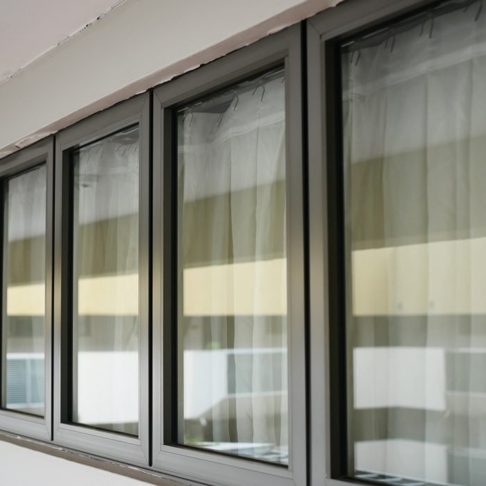 Modern building with tinted windows. Urban architecture Modern building with tinted windows. Urban architecture